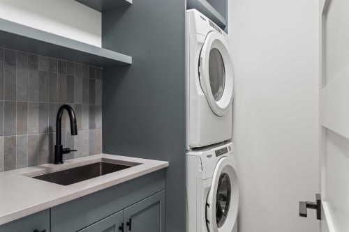 249B Three Sisters Drive, Canmore, AB - Indoor Photo Showing Laundry Room
