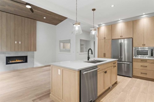 249B Three Sisters Drive, Canmore, AB - Indoor Photo Showing Kitchen With Double Sink With Upgraded Kitchen