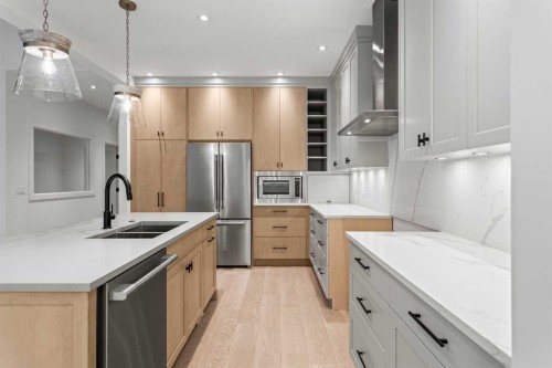 249B Three Sisters Drive, Canmore, AB - Indoor Photo Showing Kitchen With Double Sink With Upgraded Kitchen