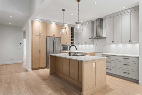 249B Three Sisters Drive, Canmore, AB - Indoor Photo Showing Kitchen With Upgraded Kitchen