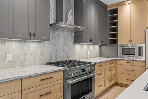 249A Three Sisters Drive, Canmore, AB - Indoor Photo Showing Kitchen With Upgraded Kitchen