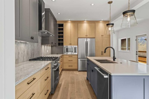 249A Three Sisters Drive, Canmore, AB - Indoor Photo Showing Kitchen With Double Sink With Upgraded Kitchen