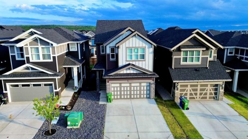 14 Sundown Close, Cochrane, AB - Outdoor With Facade