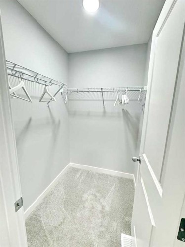 14 Sundown Close, Cochrane, AB - Indoor With Storage