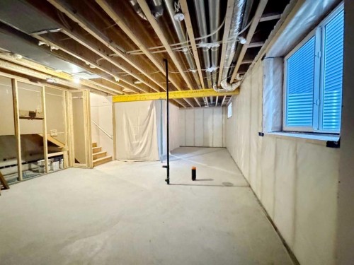 14 Sundown Close, Cochrane, AB - Indoor Photo Showing Basement