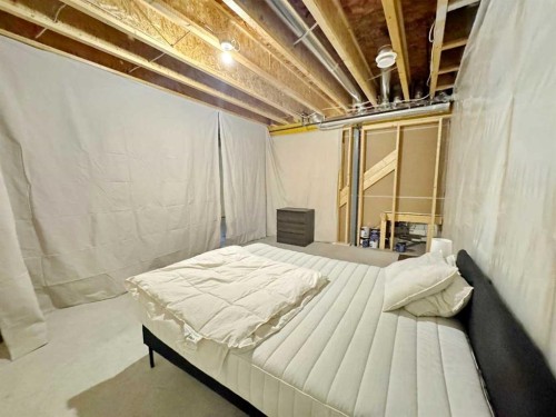 14 Sundown Close, Cochrane, AB - Indoor Photo Showing Basement