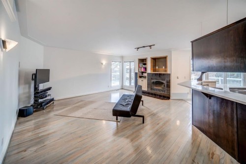 2925 Signal Hill Heights Sw, Calgary, AB - Indoor With Fireplace