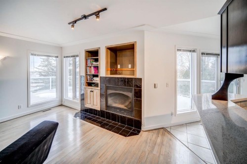 2925 Signal Hill Heights Sw, Calgary, AB - Indoor With Fireplace