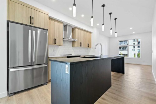 157 Mahogany Gardens Se, Calgary, AB - Indoor Photo Showing Kitchen With Upgraded Kitchen