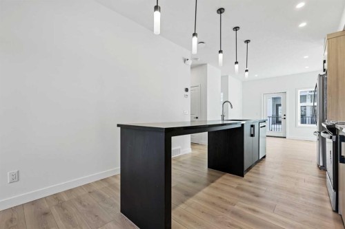 157 Mahogany Gardens Se, Calgary, AB - Indoor Photo Showing Kitchen With Upgraded Kitchen