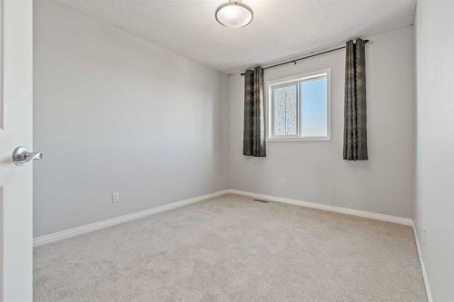 22 Silverado Plains Circle Sw, Calgary, AB - Indoor Photo Showing Other Room