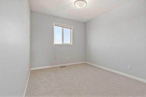 22 Silverado Plains Circle Sw, Calgary, AB - Indoor Photo Showing Other Room