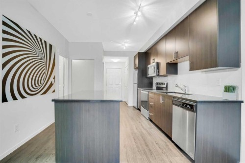 6105-151 Legacy Main Street Se, Calgary, AB - Indoor Photo Showing Kitchen With Stainless Steel Kitchen
