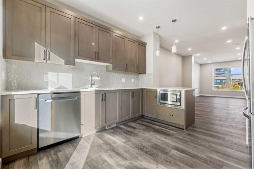 153 Mahogany Gardens Se, Calgary, AB - Indoor Photo Showing Kitchen With Upgraded Kitchen