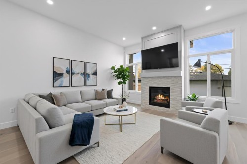 8112 Bowness Road Nw, Calgary, AB - Indoor Photo Showing Living Room With Fireplace