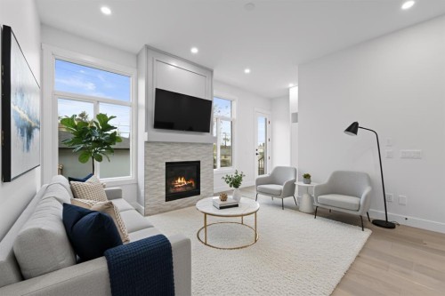 8112 Bowness Road Nw, Calgary, AB - Indoor Photo Showing Living Room With Fireplace