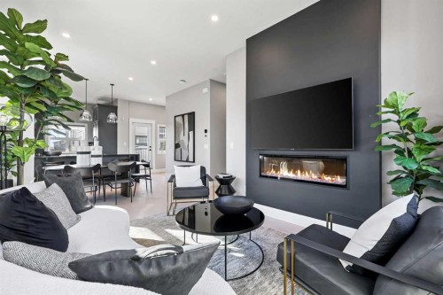 113-595 Mahogany Road Se, Calgary, AB - Indoor Photo Showing Living Room With Fireplace