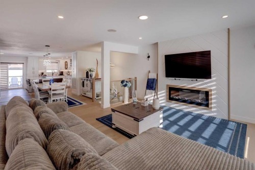 4620 30 Avenue Sw, Calgary, AB - Indoor Photo Showing Living Room With Fireplace