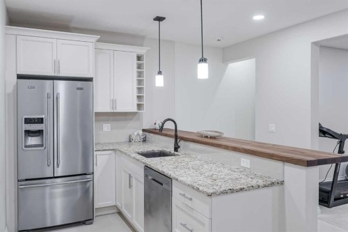 310 Mahogany Manor Se, Calgary, AB - Indoor Photo Showing Kitchen With Stainless Steel Kitchen With Upgraded Kitchen