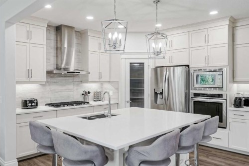 310 Mahogany Manor Se, Calgary, AB - Indoor Photo Showing Kitchen With Stainless Steel Kitchen With Double Sink With Upgraded Kitchen