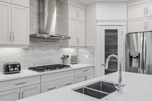 310 Mahogany Manor Se, Calgary, AB - Indoor Photo Showing Kitchen With Double Sink With Upgraded Kitchen