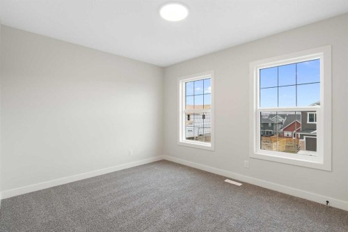 338 Rivercrest Road, Cochrane, AB - Indoor Photo Showing Other Room