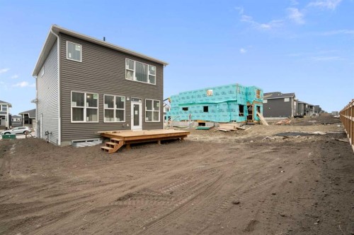 338 Rivercrest Road, Cochrane, AB - Outdoor With Exterior