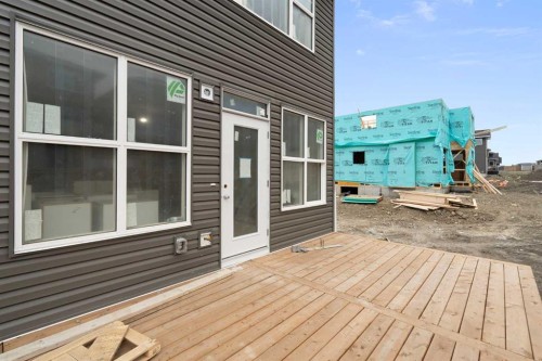 338 Rivercrest Road, Cochrane, AB - Outdoor With Deck Patio Veranda With Exterior