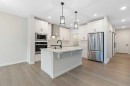 338 Rivercrest Road, Cochrane, AB  - Indoor Photo Showing Kitchen With Stainless Steel Kitchen With Upgraded Kitchen 