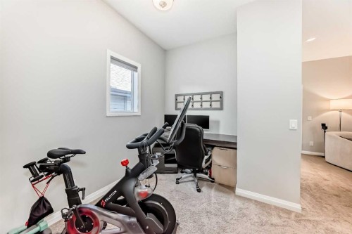 10 Riviera Place, Cochrane, AB - Indoor Photo Showing Gym Room