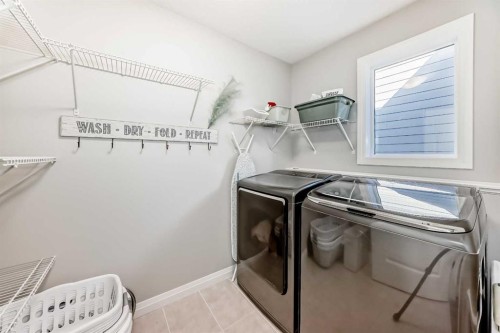 10 Riviera Place, Cochrane, AB - Indoor Photo Showing Laundry Room