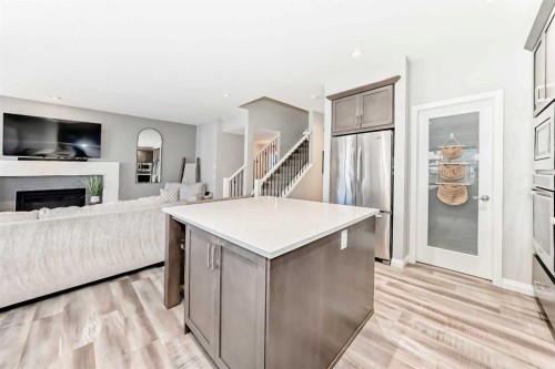 10 Riviera Place, Cochrane, AB - Indoor With Fireplace