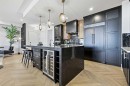 201-130 Marina Cove Se, Calgary, AB  - Indoor Photo Showing Kitchen With Upgraded Kitchen 