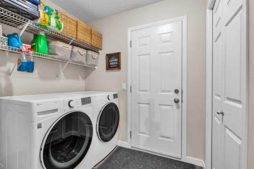 210 Evansmeade Point Nw, Calgary, AB - Indoor Photo Showing Laundry Room