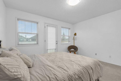 210 Evansmeade Point Nw, Calgary, AB - Indoor Photo Showing Bedroom