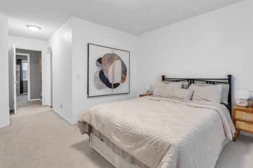 210 Evansmeade Point Nw, Calgary, AB - Indoor Photo Showing Bedroom