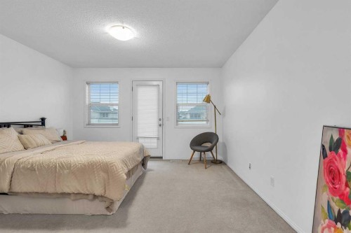 210 Evansmeade Point Nw, Calgary, AB - Indoor Photo Showing Bedroom
