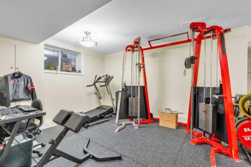 210 Evansmeade Point Nw, Calgary, AB - Indoor Photo Showing Gym Room