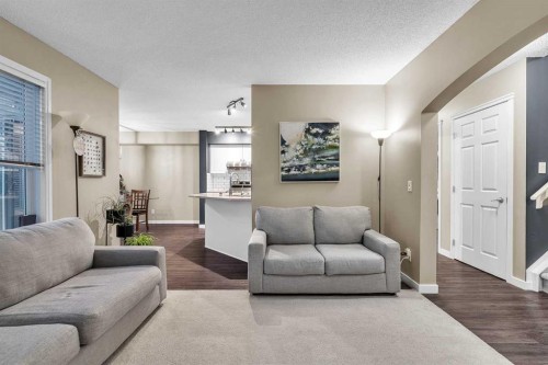 210 Evansmeade Point Nw, Calgary, AB - Indoor Photo Showing Living Room