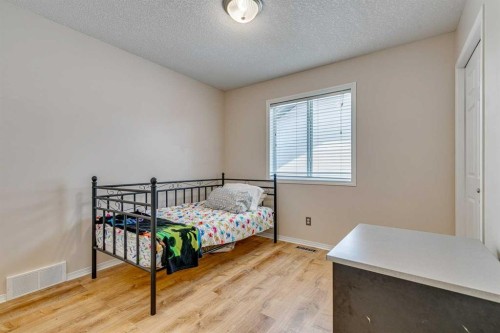 214 Springmere Close, Chestermere, AB - Indoor Photo Showing Bedroom