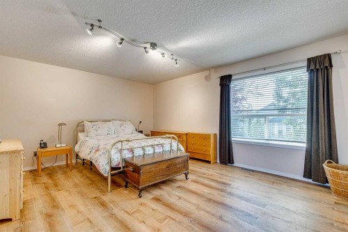 214 Springmere Close, Chestermere, AB - Indoor Photo Showing Bedroom