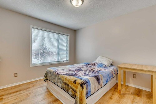 214 Springmere Close, Chestermere, AB - Indoor Photo Showing Bedroom