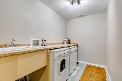 214 Springmere Close, Chestermere, AB - Indoor Photo Showing Laundry Room