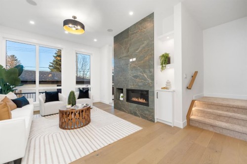 1444 43 Street Sw, Calgary, AB - Indoor Photo Showing Living Room With Fireplace