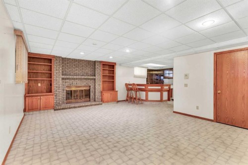 125 Edgebrook Road Nw, Calgary, AB - Indoor With Fireplace