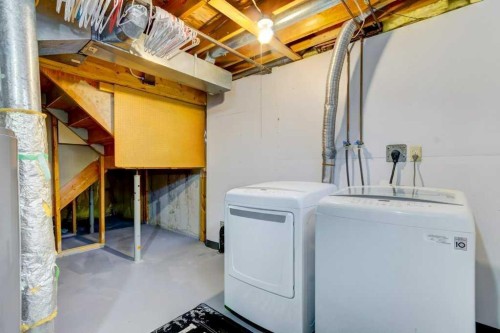 22 Hunters Gate, Okotoks, AB - Indoor Photo Showing Laundry Room