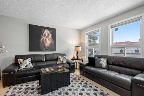 22 Hunters Gate, Okotoks, AB - Indoor Photo Showing Living Room
