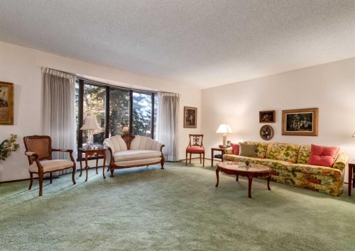 268 Pump Hill Gardens Sw, Calgary, AB - Indoor Photo Showing Living Room