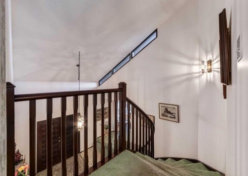 268 Pump Hill Gardens Sw, Calgary, AB - Indoor Photo Showing Other Room