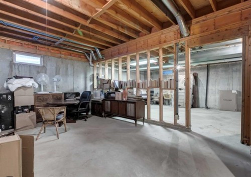 268 Pump Hill Gardens Sw, Calgary, AB - Indoor Photo Showing Basement